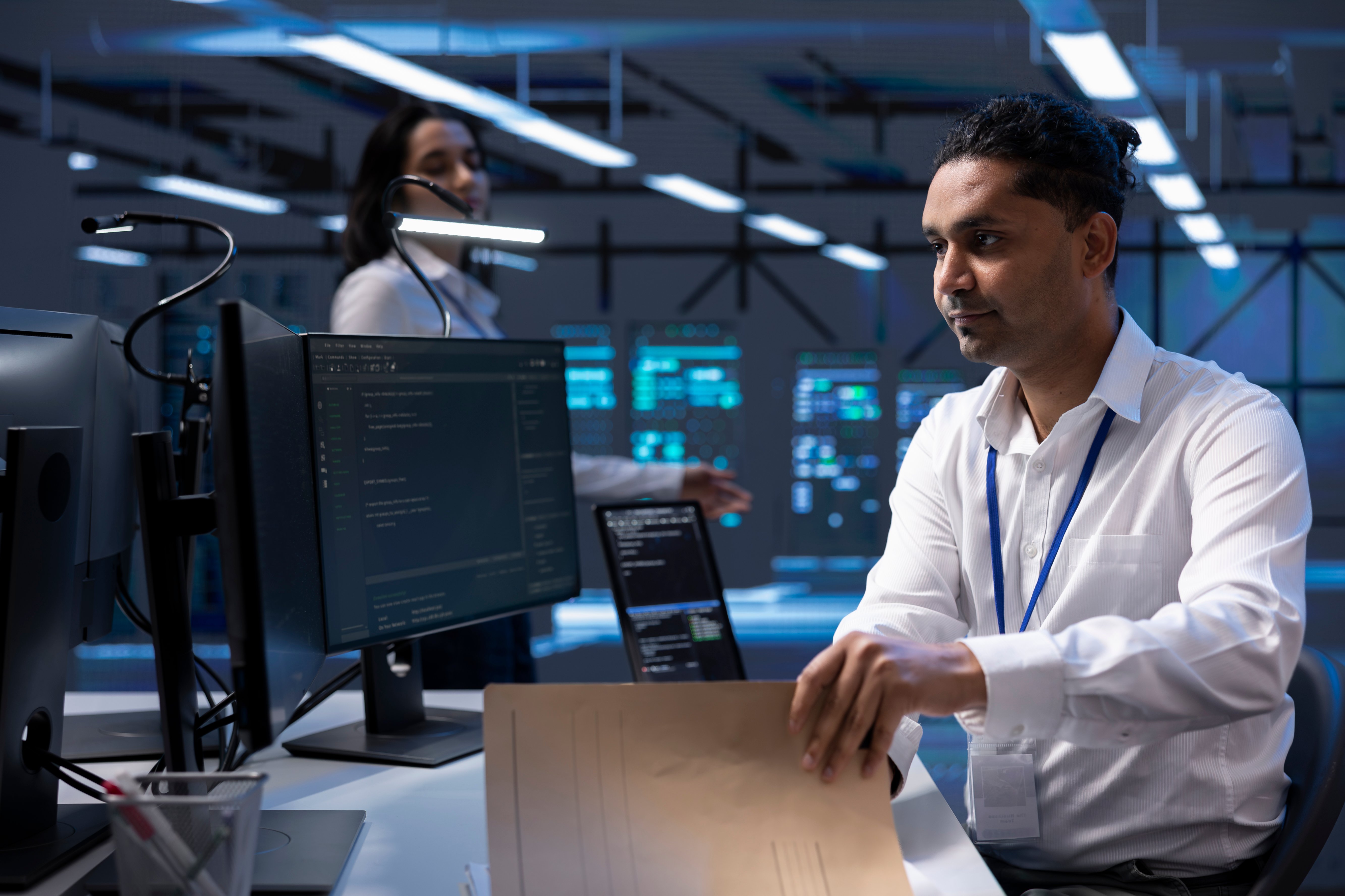 man-in-server-room-ensuring-compliance-with-indust-2025-02-19-23-49-53-utc