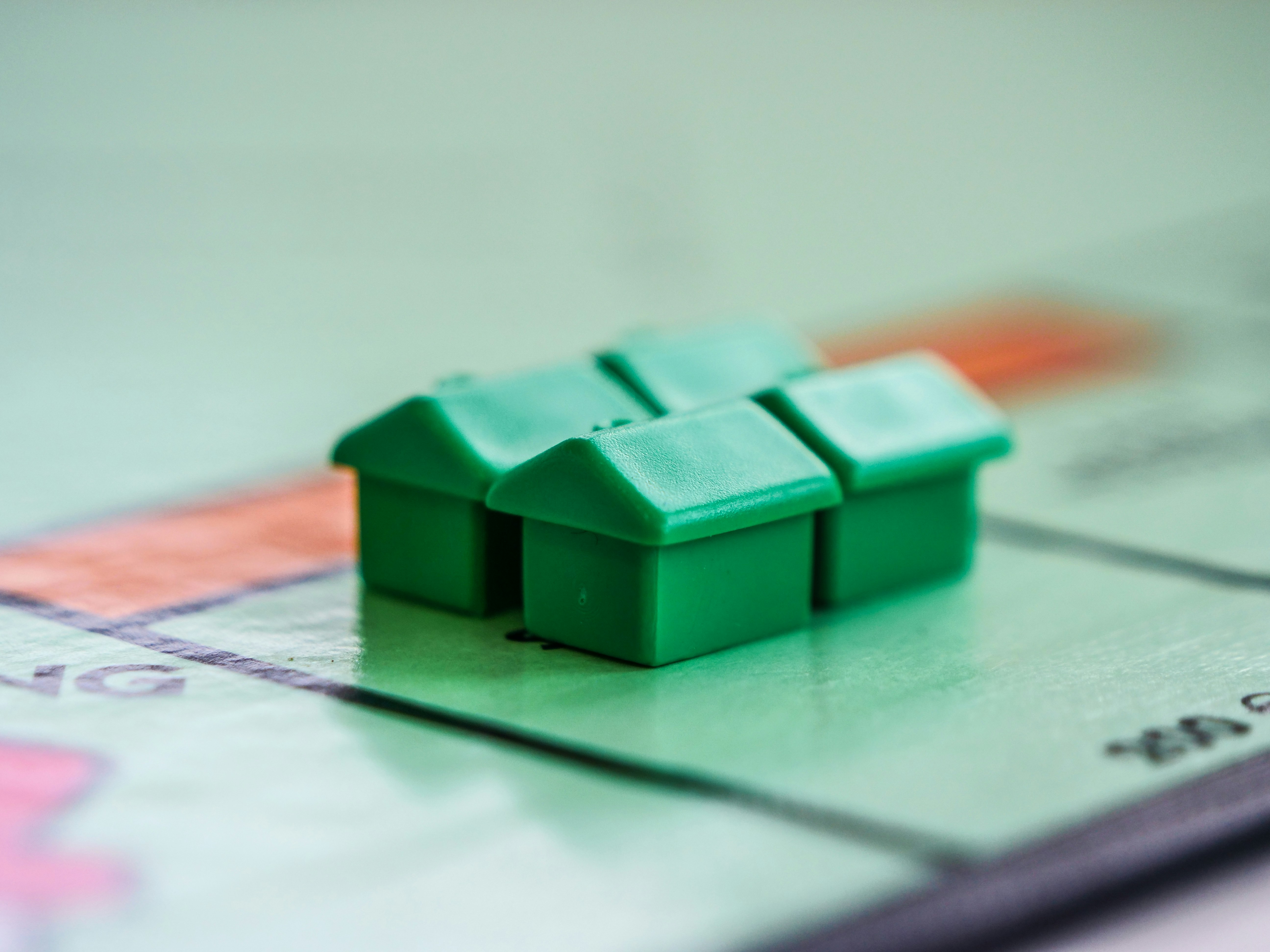 Picture of a Monopoly board game, implying a merger and acquisition